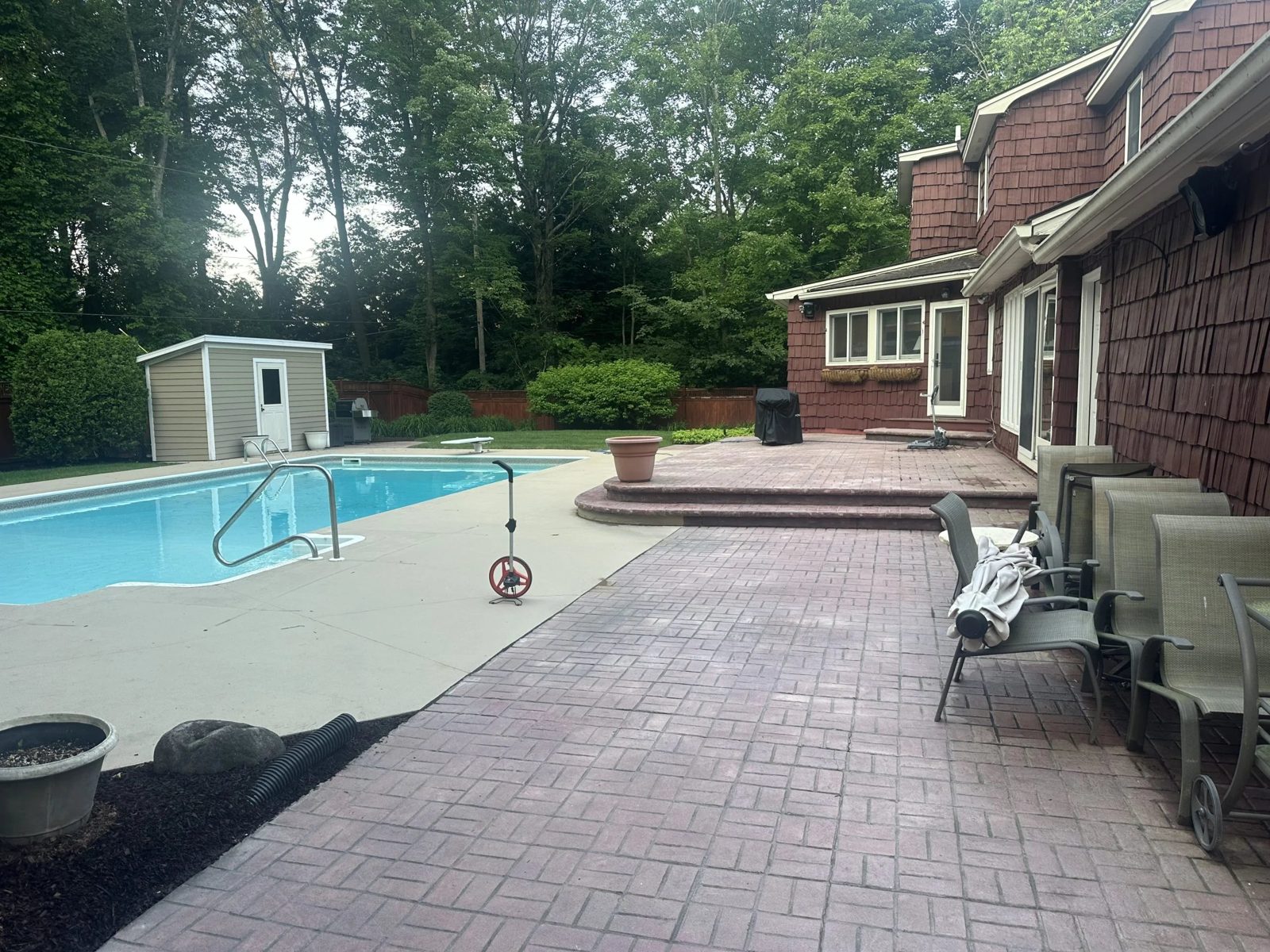 Cambridge paver pool patio and steps after renovation